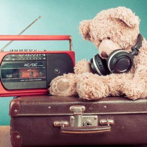 consumer goods repair items from a teddy with headphones to radios and suitcases