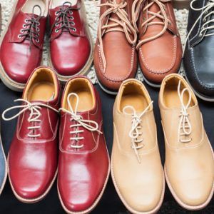 Handsome, bright shoes following footwear repair services